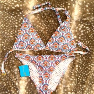 Letare bikini with tags… blue red motif on exterior and red dot interior